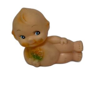 Kewpie doll Boy laying down vintage 1980s vinyl baby Taiwan 3.5" with flowers